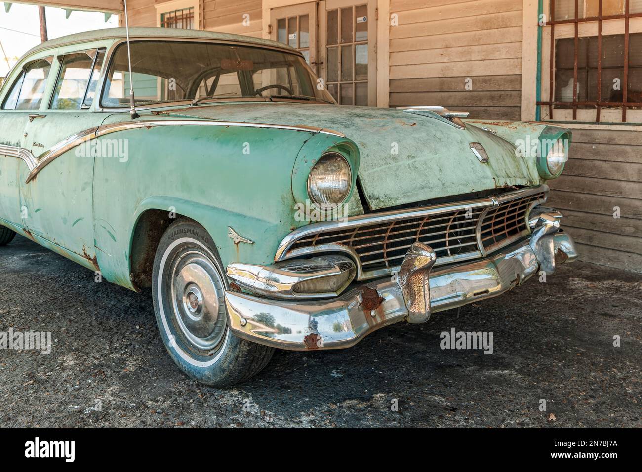 Vintage or antique 1956 Ford Fairlane Town Sedan front grill and hood of the old automobile in Alabama, USA. Stock Photo