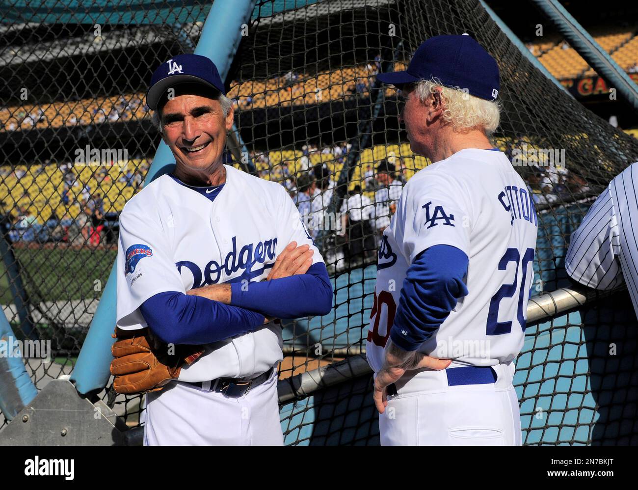 Sandy Koufax, left, and Don Sutton talk during batting practice prior
