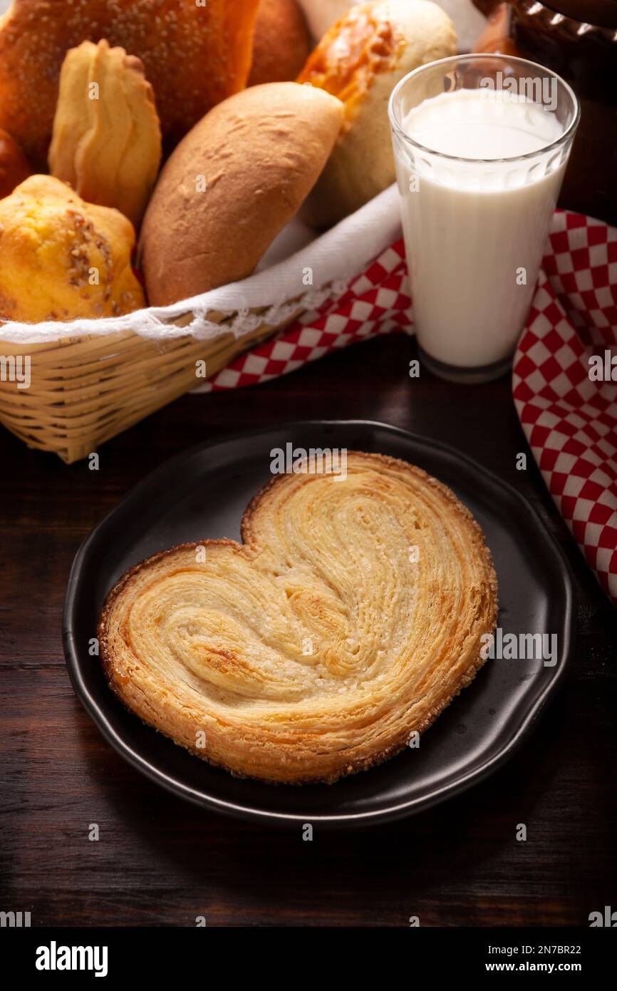 Oreja. Mexican sweet bread made with puff pastry, its name comes from its shape similar to that of ears, of French origin, where it is known as Elepha Stock Photo