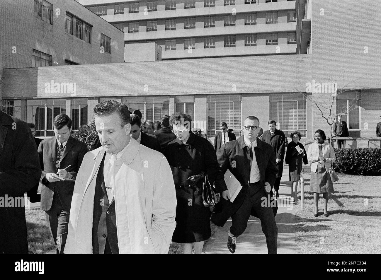 Earl Ruby of Detroit, followed by his sister, Eileen Kaminsky of ...