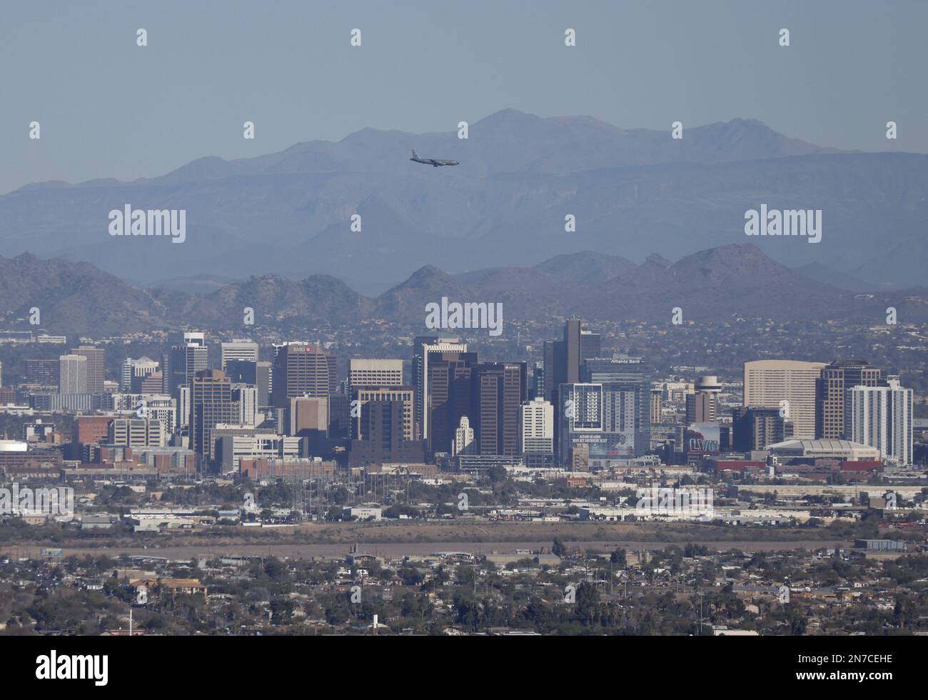 Phoenix, United States. 09th Feb, 2023. Aircraft fly over the downtown