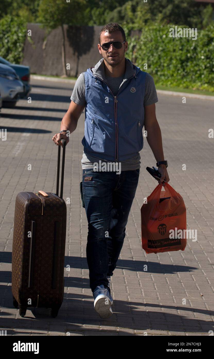 Spain's Roberto Soldado arrives for a training session in Las Rozas, just  outside of Madrid, Spain Tuesday June 4, 2013. The Spanish team travel to  the U.S. later Tuesday where they will