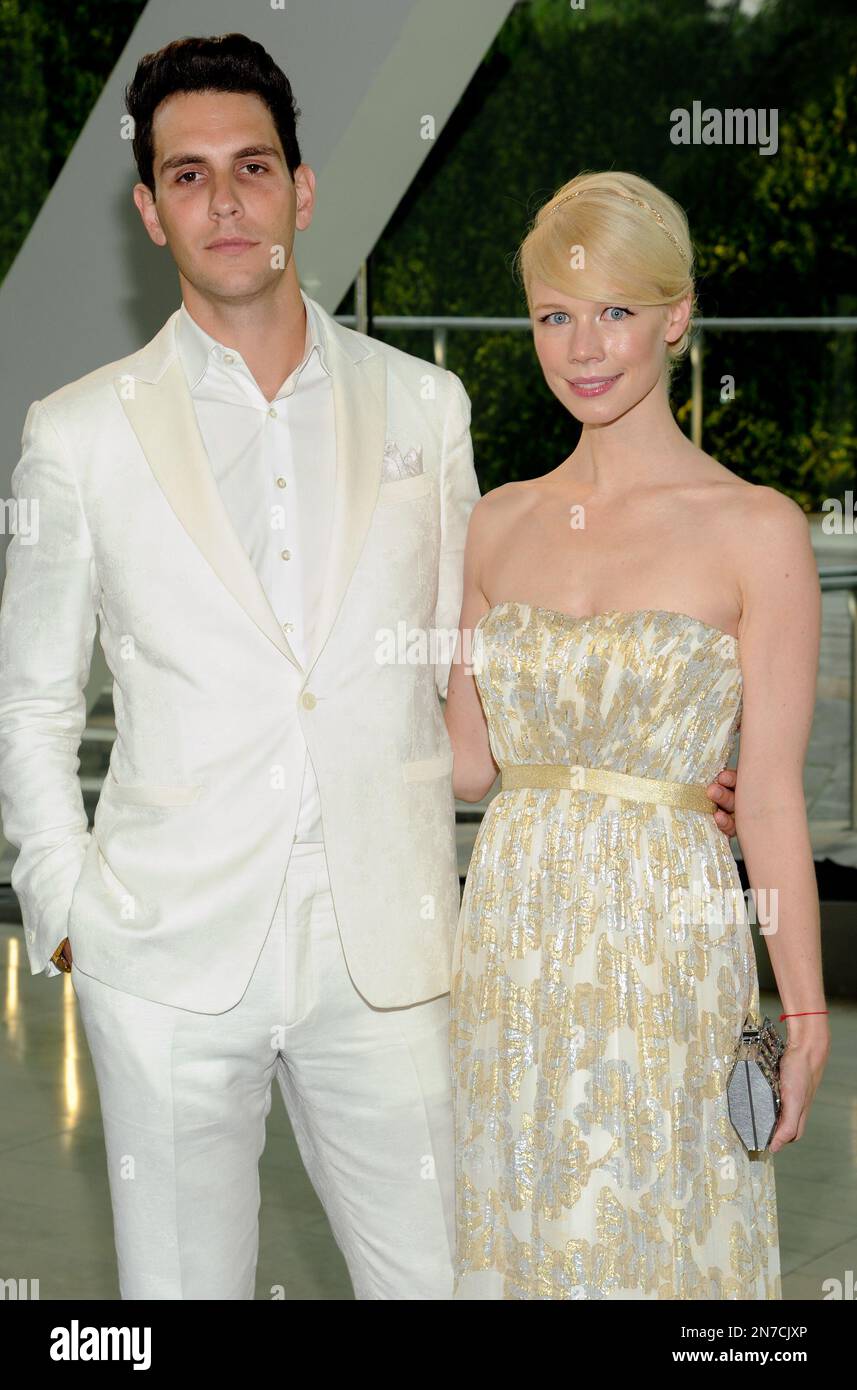 Singer Gabe Saporta and wife designer Erin Fetherston attend the 2013