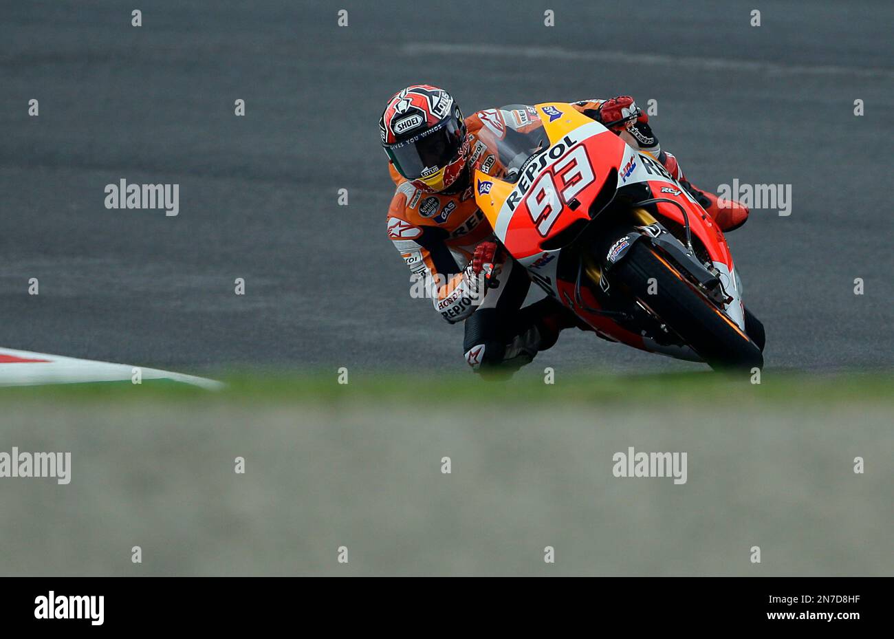 Spain's Marc Marquez takes a curve with his Honda during the free practice  session for Sunday's Italian Moto GP, at the Mugello race circuit, in  Scarperia, Italy, Friday, May 31, 2013. (AP