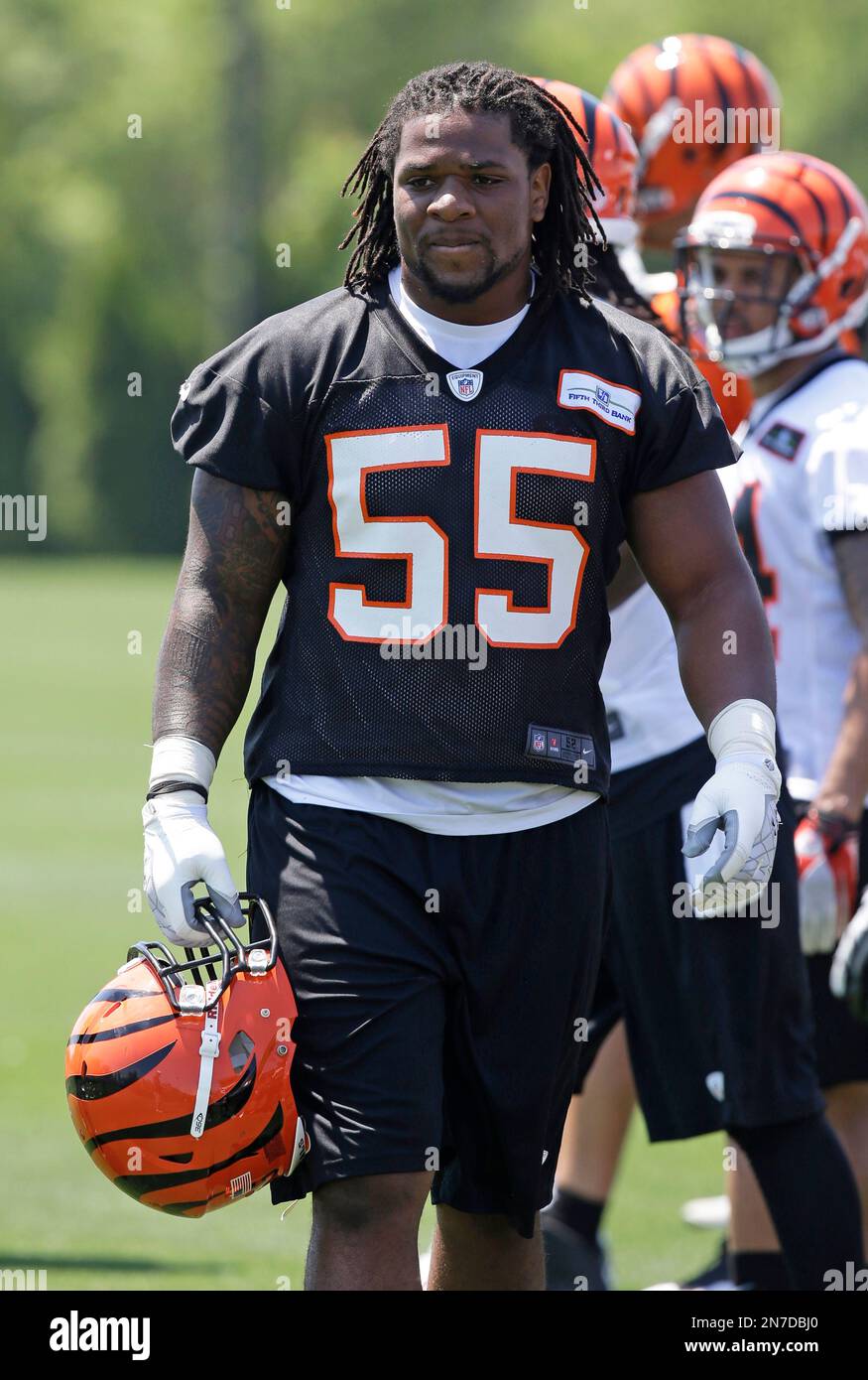 Cincinnati Bengals linebacker Vontaze Burflict takes a break during an