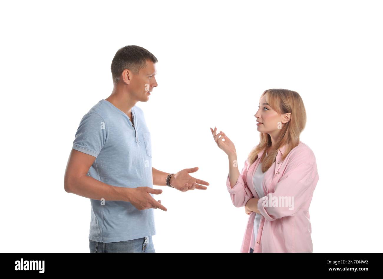 Man and woman talking on white background Stock Photo - Alamy