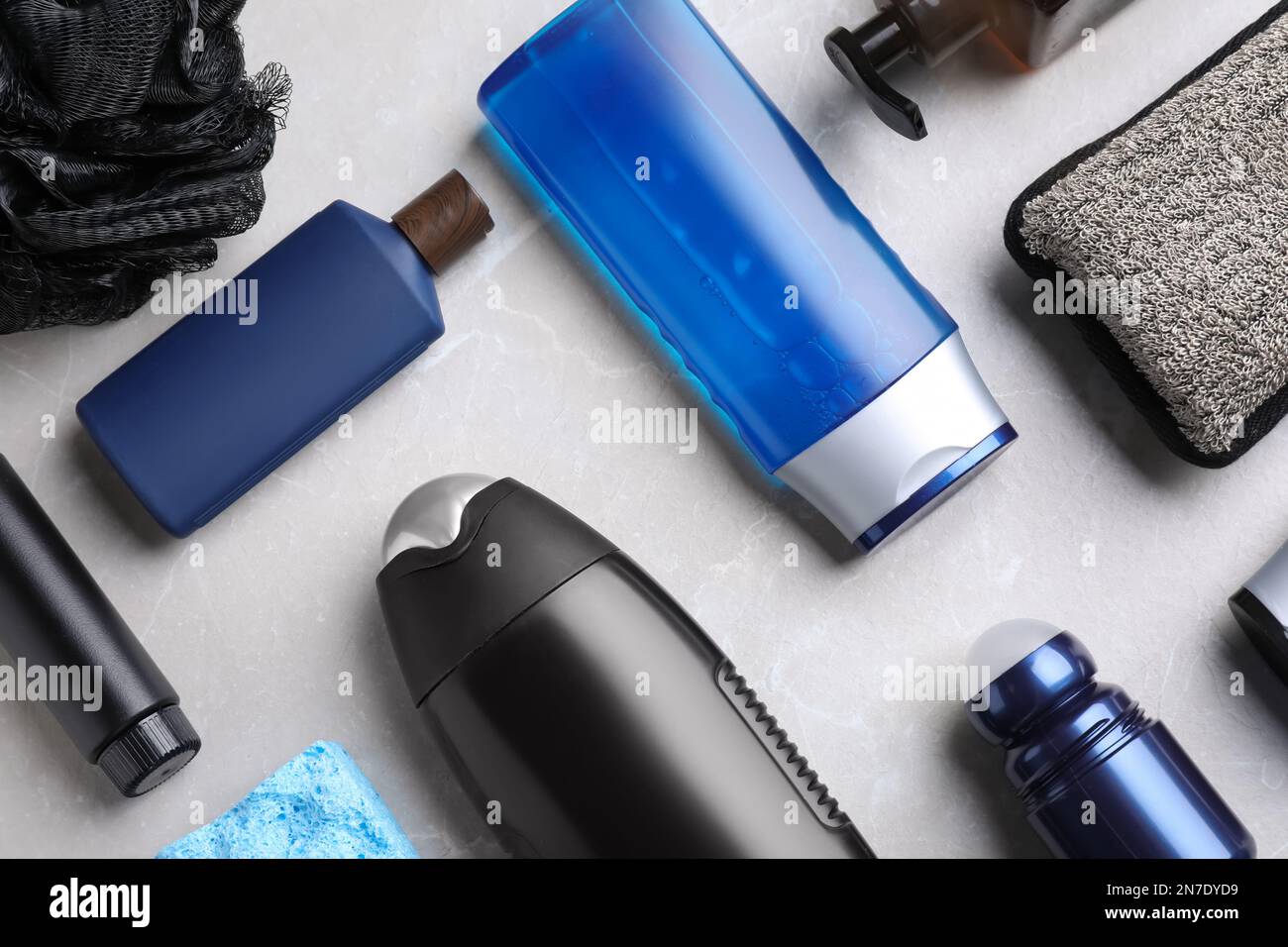 Flat lay composition with men's cosmetics on light grey marble ...