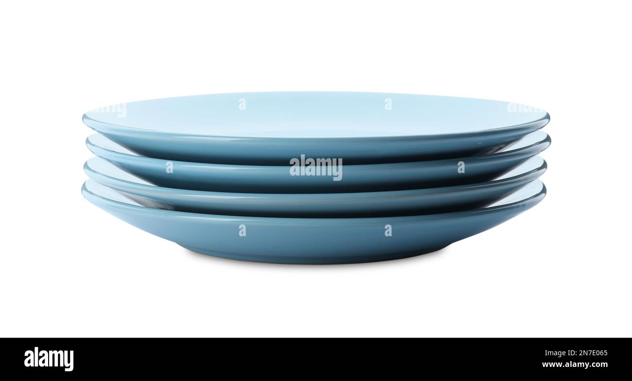 Clean empty ceramic plates on white background Stock Photo - Alamy