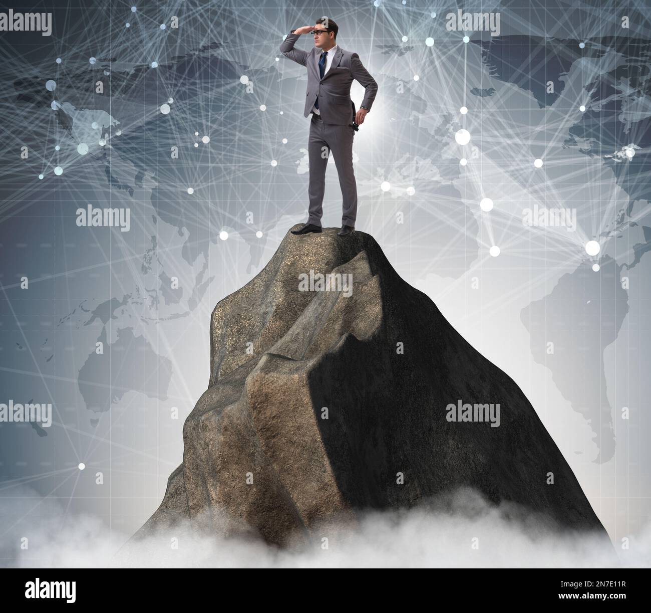 The businessman at the top of mountain Stock Photo - Alamy
