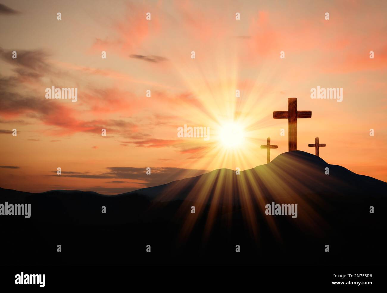 Christian crosses on hill outdoors at sunset.  Crucifixion Of Jesus Stock Photo