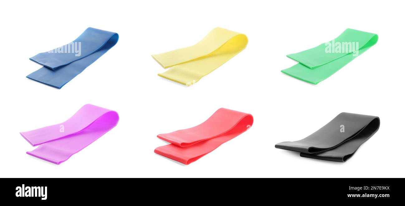 Set of different fitness elastic bands on white background, banner