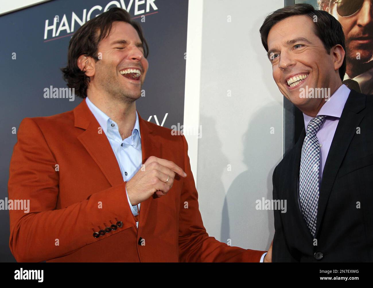 Bradley Cooper, left, and Ed Helms pose together at the LA Premiere of