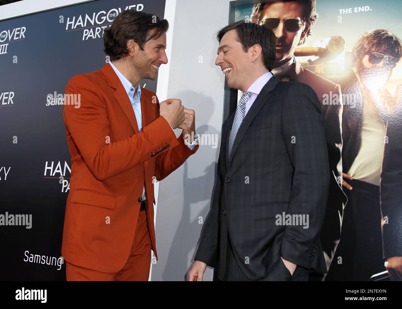 Bradley Cooper, left, and Ed Helms pose together at the LA Premiere of