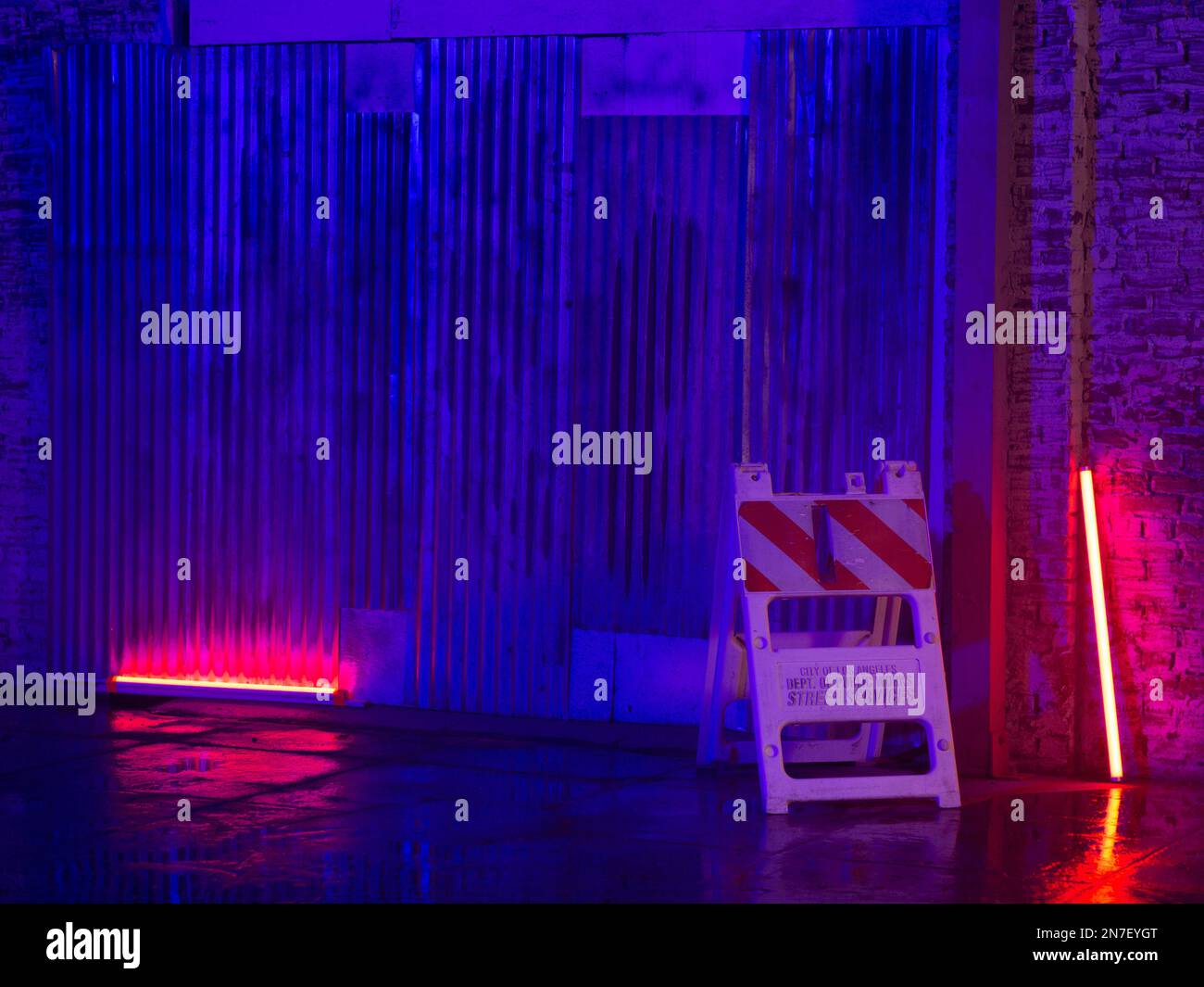 LED lighting tubes illuminate a scene with deep Red and Blue color