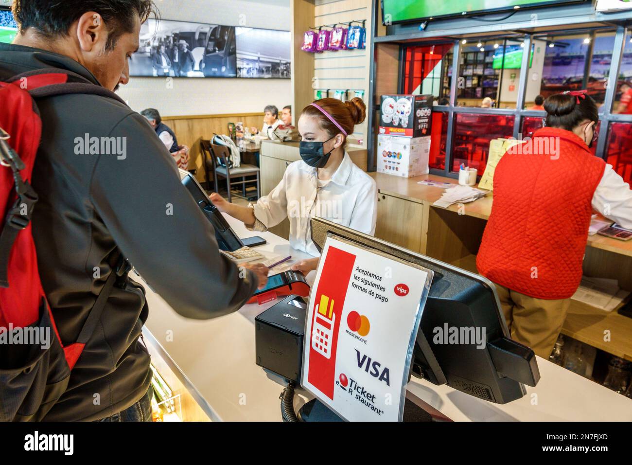 Mexico City,Central de Autobuses del Norte,Northern Bus Station,Vips cashier paying customer counter,man men male,woman women lady female,adult adults Stock Photo