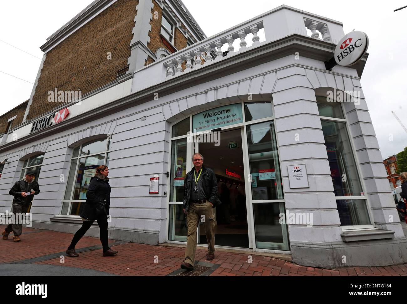 People walk past a branch of the HSBC bank in London, Wednesday 