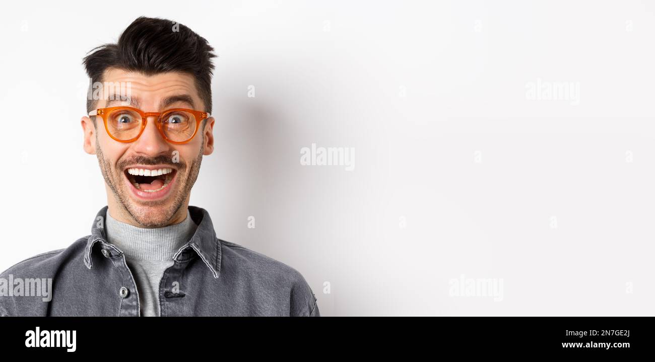 Funny excited man in glasses hi-res stock photography and images - Alamy