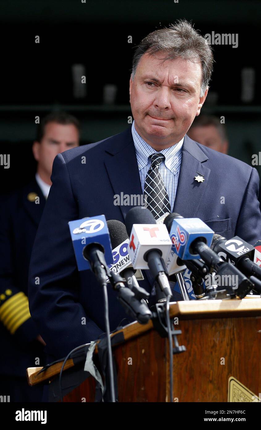 San Mateo County coroner Robert Foucrault speaks at a news conference