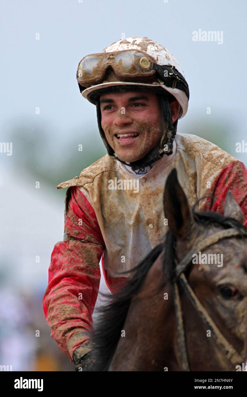 Jockey Joel Rosario celebrates after winning the 139th running of the