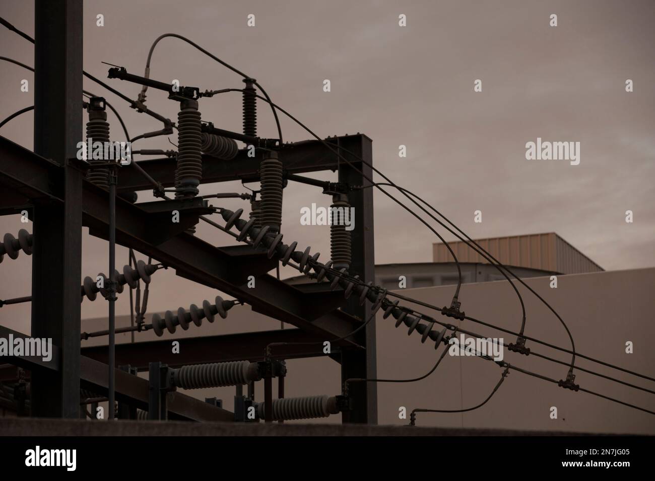Ominous sunset view of of an electrical substation and power lines. Stock Photo