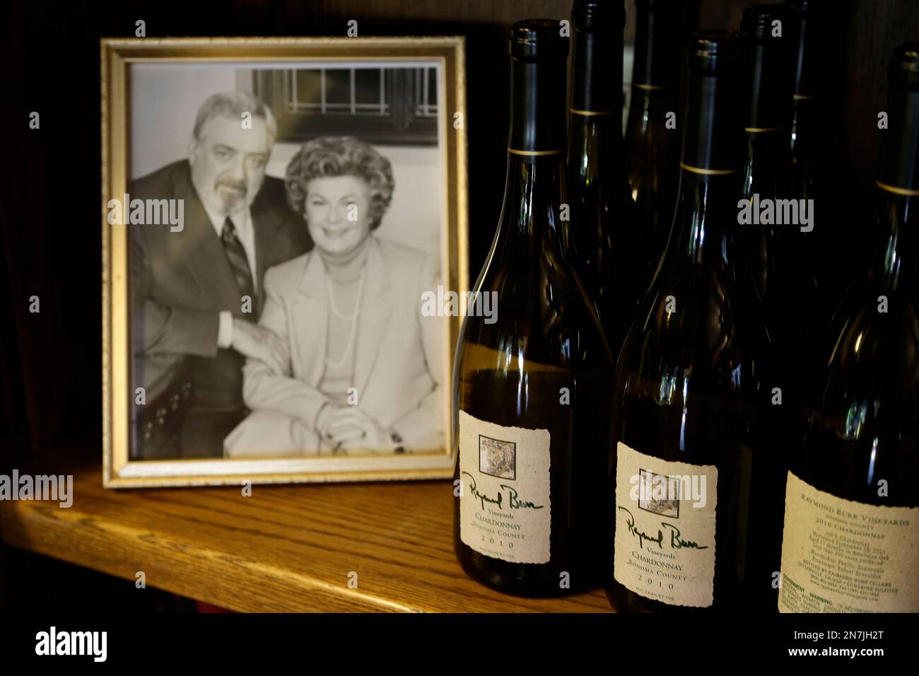 In this photo taken Thursday, April 11, 2013 bottles of Chardonnay are