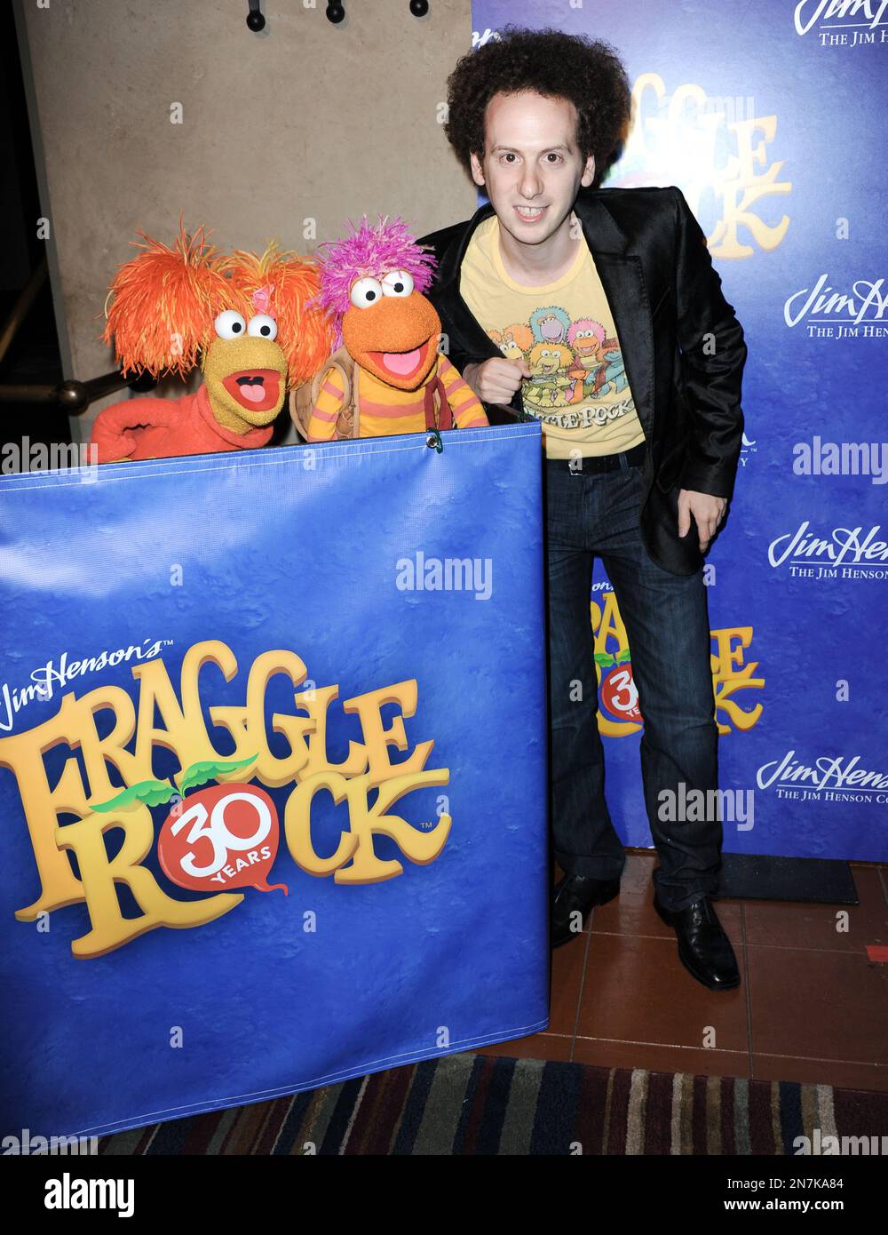 Red Fraggle, left, Gobo Fraggle, and Josh Sussman arrive at Jim Henson