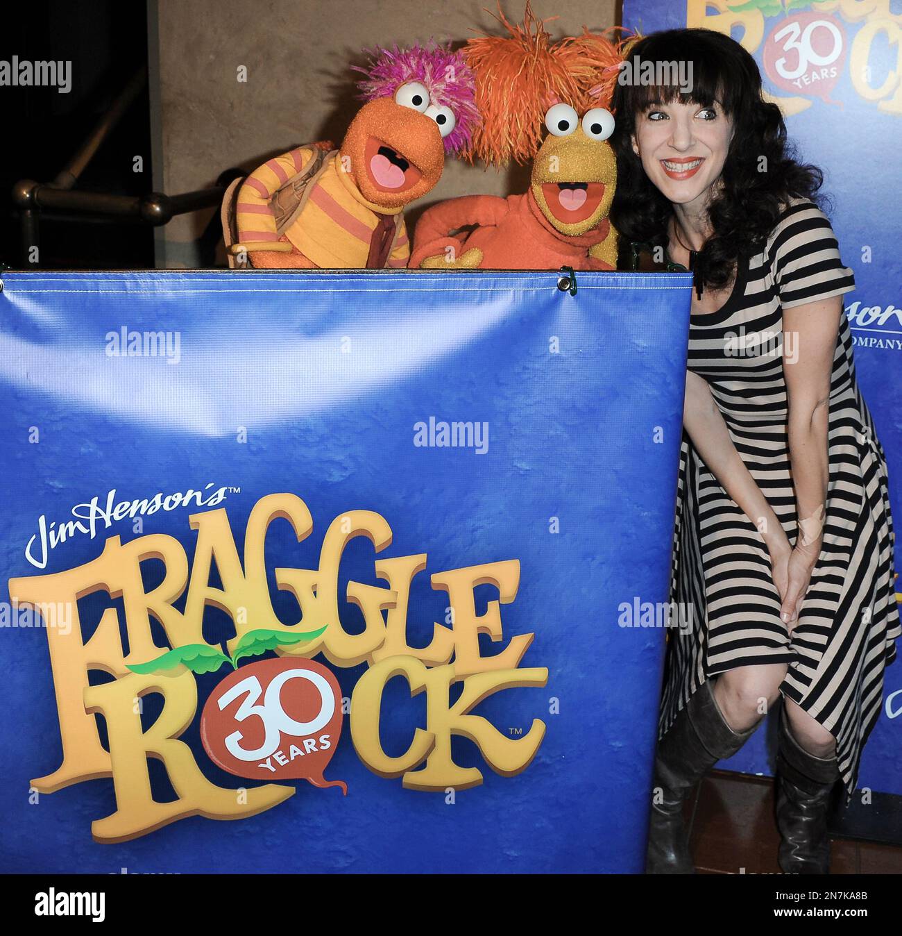 Red Fraggle, left, Gobo Fraggle, and Jackie Geary arrive at Jim Henson
