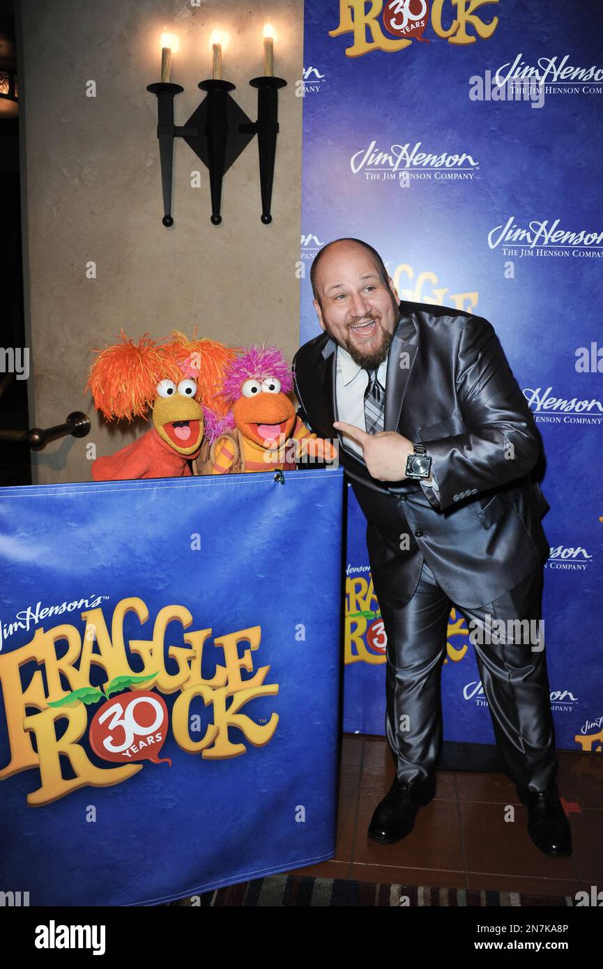 Red Fraggle, left, Gobo Fraggle, and Steven Glickman arrive at Jim