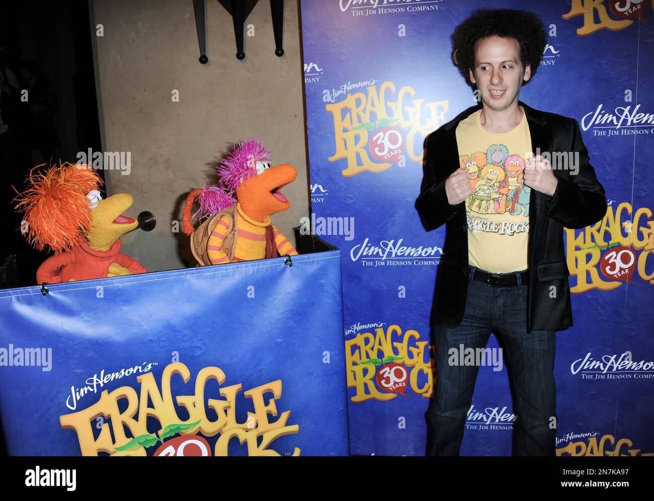 Red Fraggle, left, Gobo Fraggle, and Josh Sussman arrive at Jim Henson