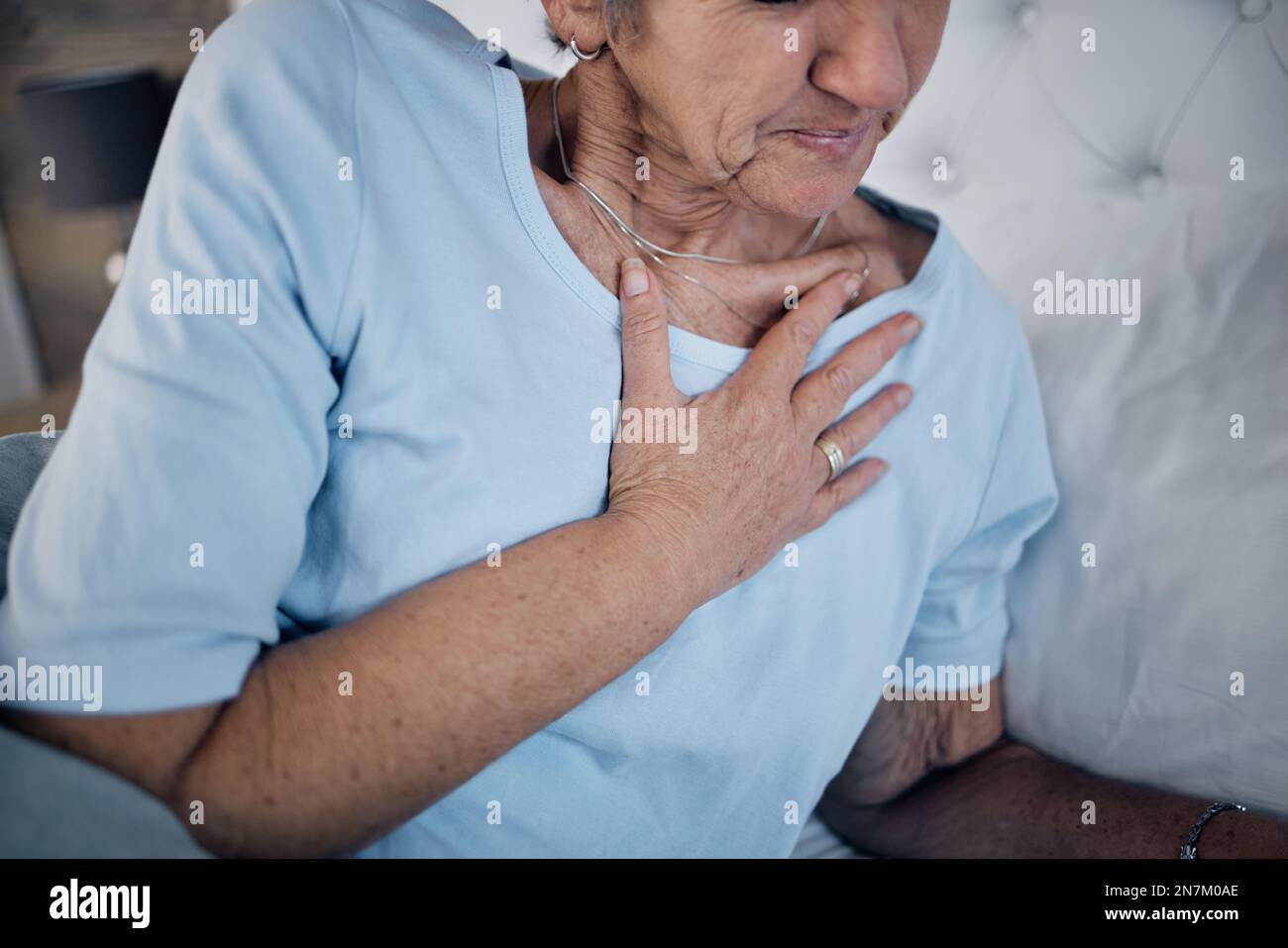 Health, old woman in bed and chest pain in the morning, and
