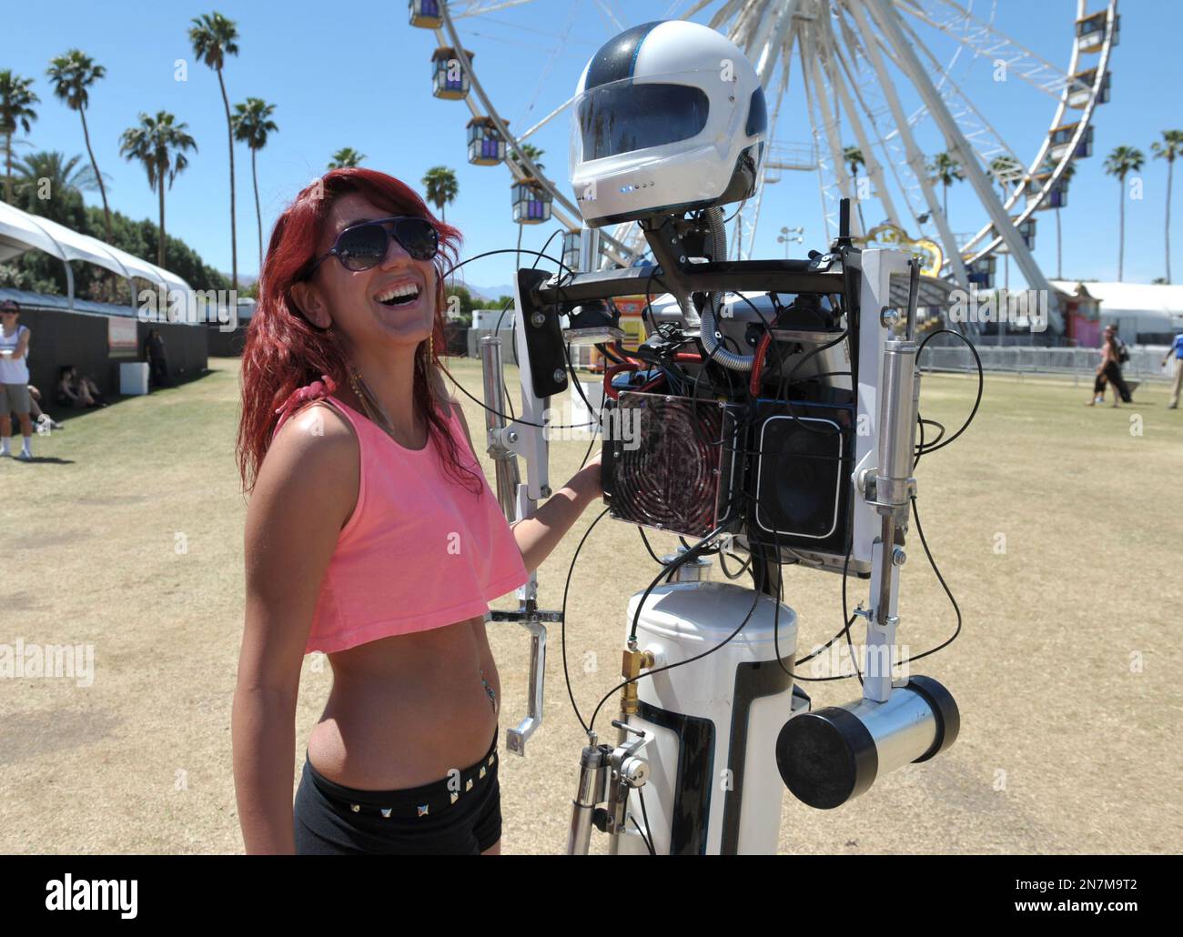 Suzie Balian interacts with "Hotshot the Robot" at the 2nd weekend of