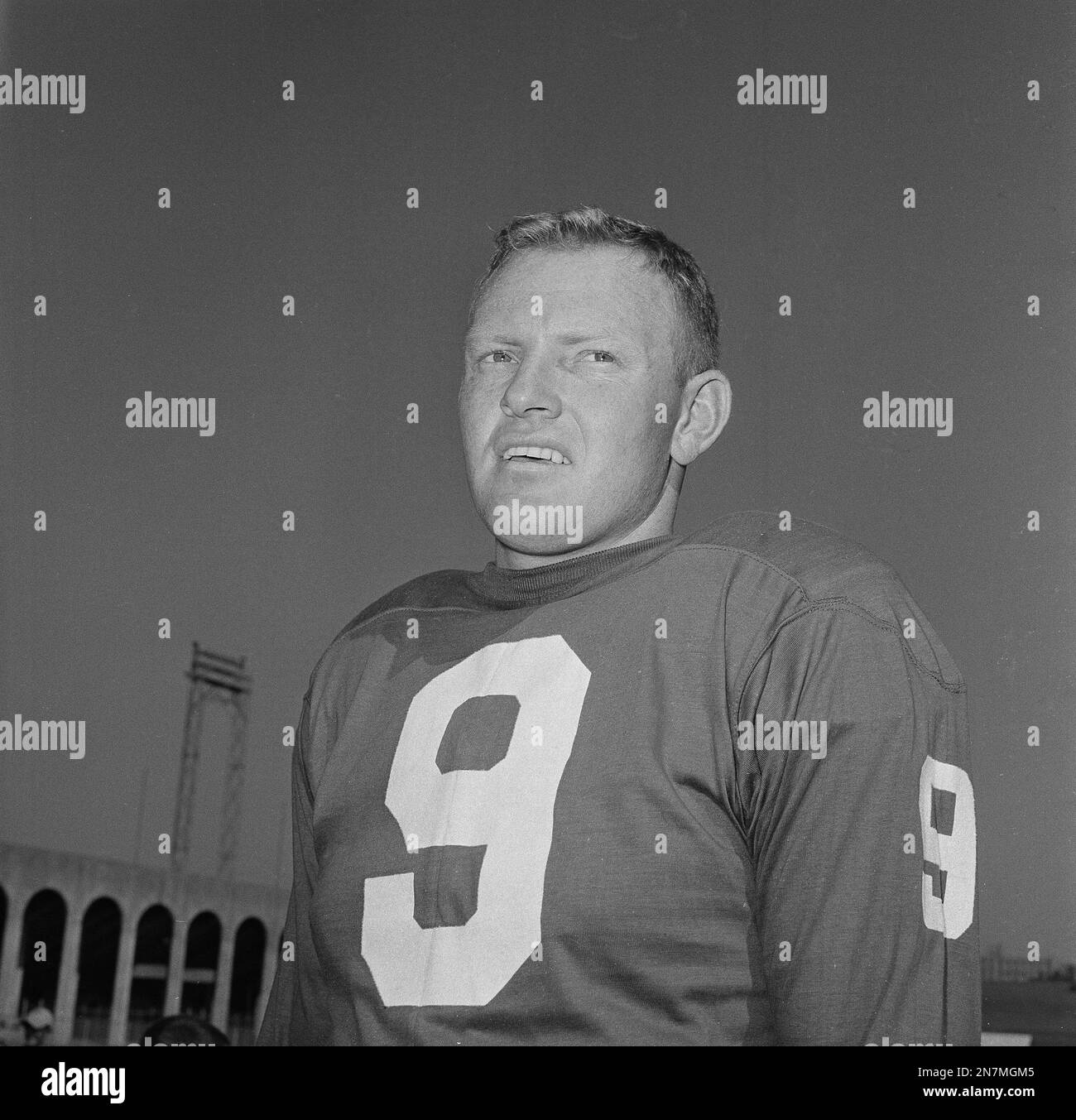 Sonny Jurgensen, Philadelphia Eagles quarterback, injured in the NFL  playoff game at Miami, rests in bed at Philadelphia's Hahnemann Hospital,  Jan. 8, 1962, with nurse Judy Green standing by. Jurgensen suffered a