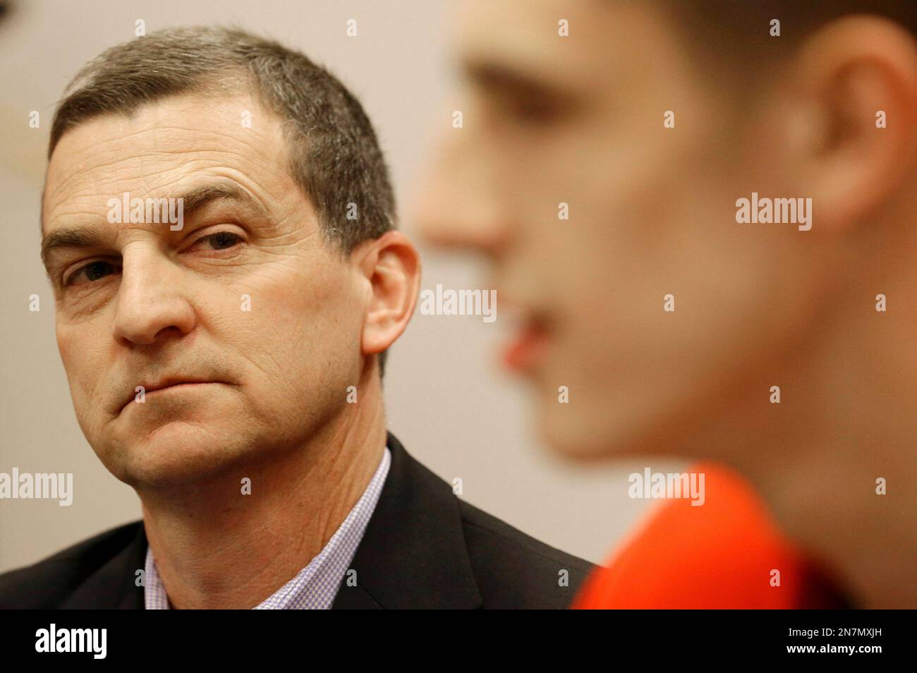 Maryland head coach mark turgeon left listens as center alex len of