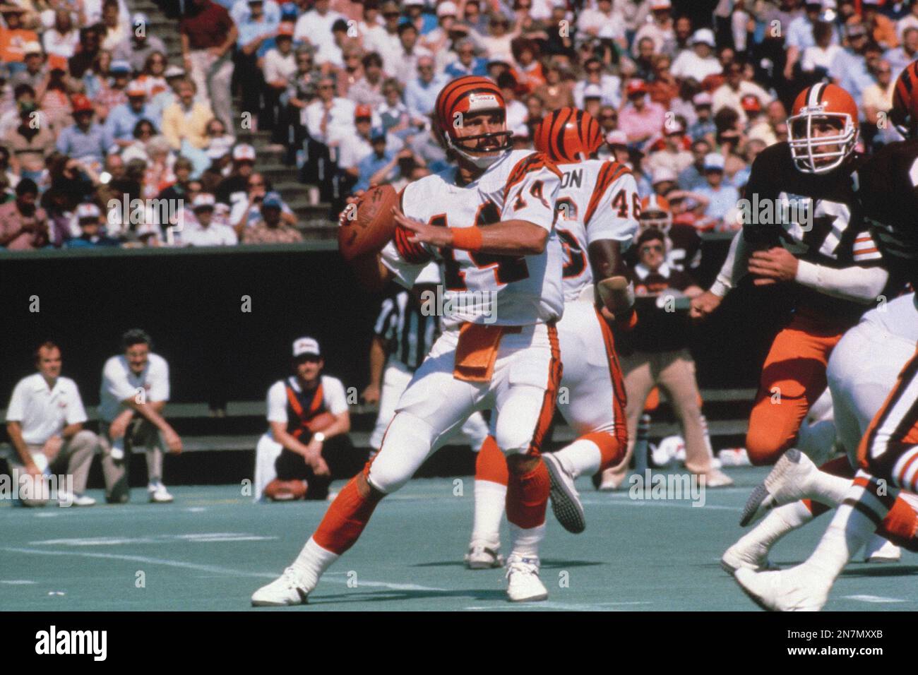 Cincinnati Bengals quarterback Ken Anderson, (14) releases the ball as New  York Jets' Kenny Neil (77)