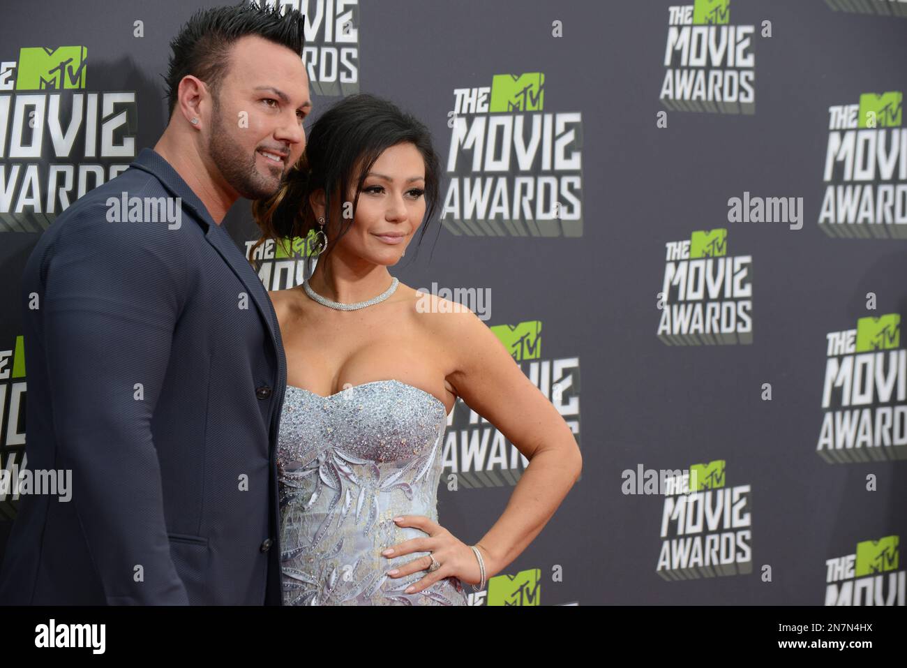 Jenni "Jwoww" Farley, right, and Roger Mathews arrive at the MTV Movie