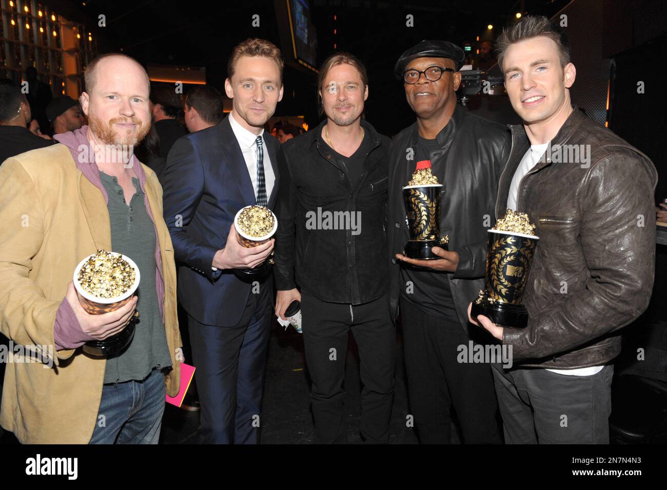 Actor Brad Pitt, center, and from left, director Joss Whedon, actors ...
