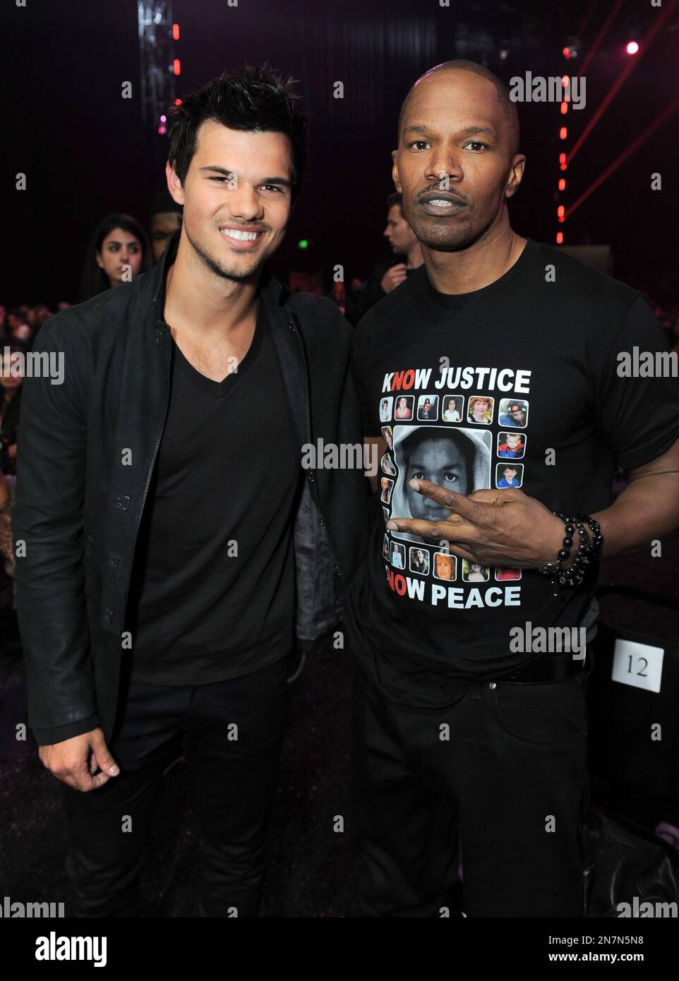 IMAGE DISTRIBUTED FOR MTV Actors Taylor Lautner and Jamie Foxx pose