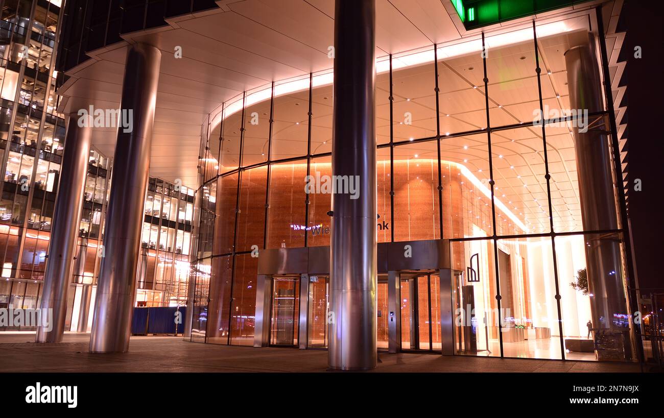 Modern office building in city at the night. View on illuminated