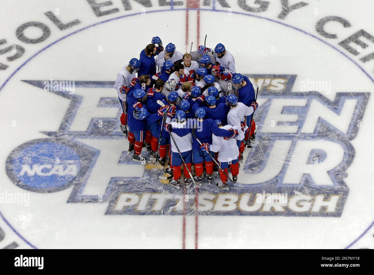 The UMass Lowell Men s NCAA Hockey Team Gathers At Center Ice During A the-umass-lowell-men-s-ncaa-hockey-team-gathers-at-center-ice-during-a