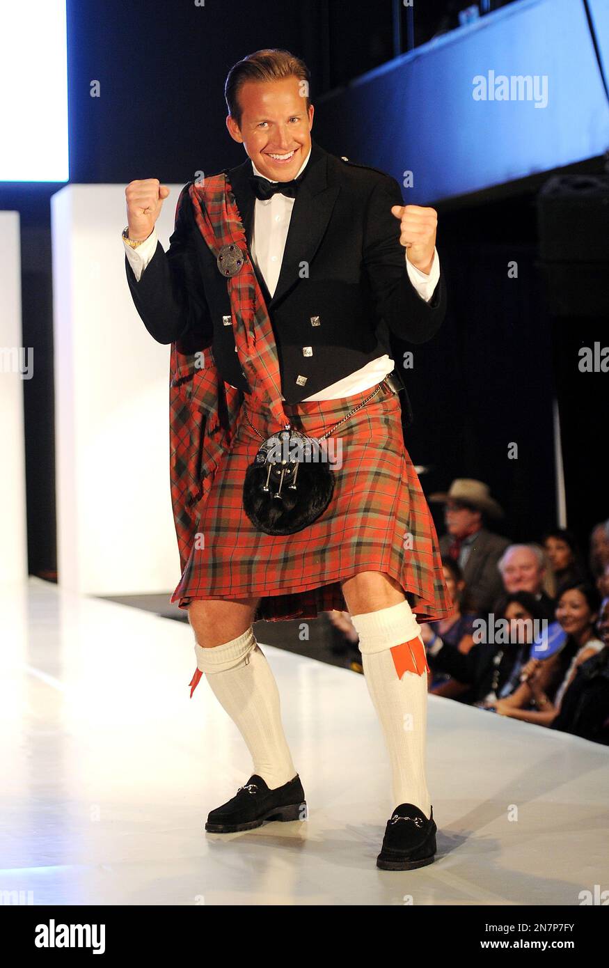 News anchor Chris Wragge walks the runway at the "From Scotland With