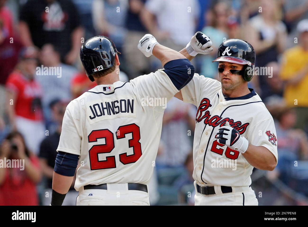 Atlanta Braves' Dan Uggla, right, puts his arm around Florida