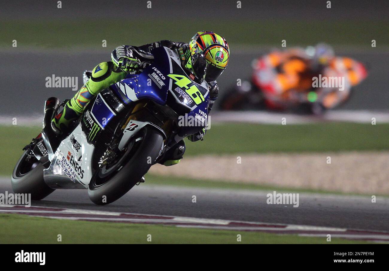 Italian MotoGP rider Valentino Rossi of the Yamaha Factory Racing during  the final practice session of Qatar MotoGP at Losail Circuit in Doha, Qatar,  on Sunday, April 7, 2013. (AP Photo/Osama Faisal