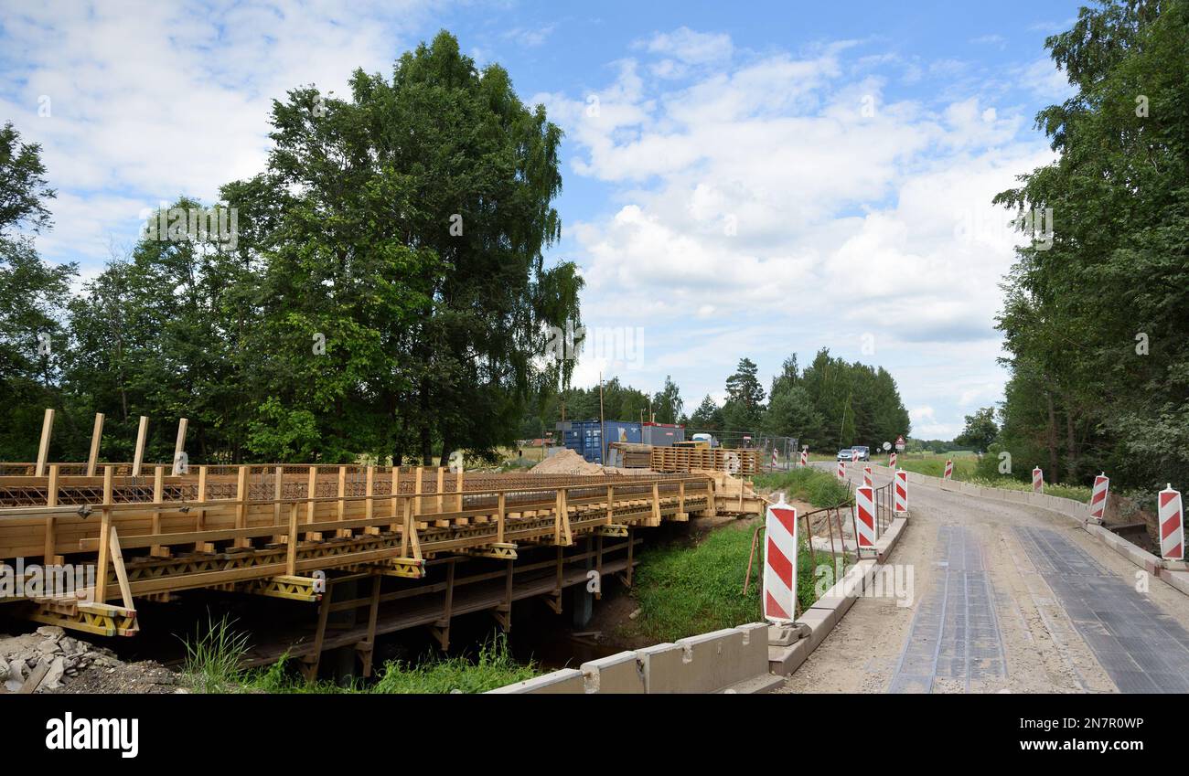 View of old road repair with temporary bridge Stock Photo - Alamy