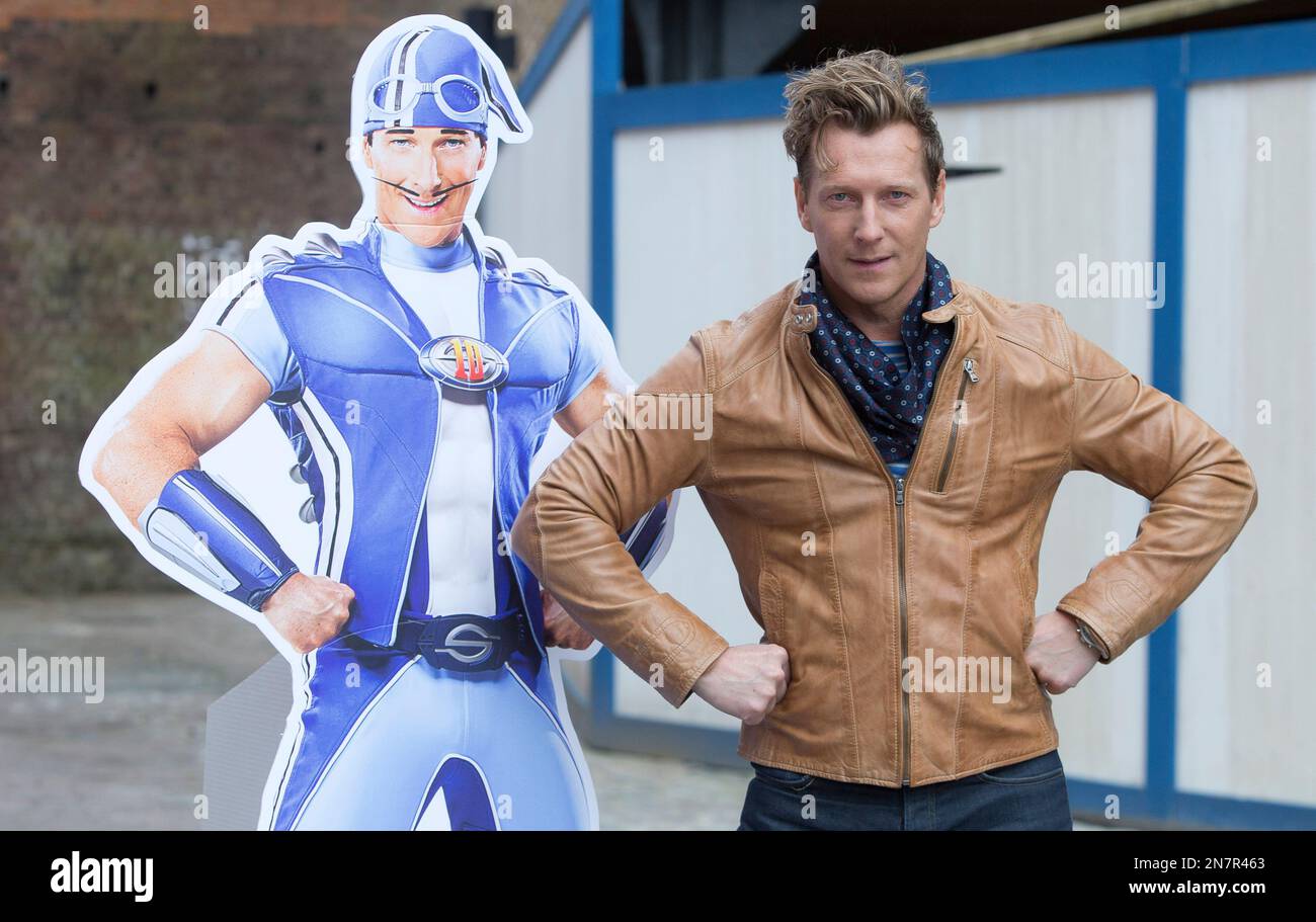 Magnus Scheving, the creator and co star of LazyTown, holds a cardboard