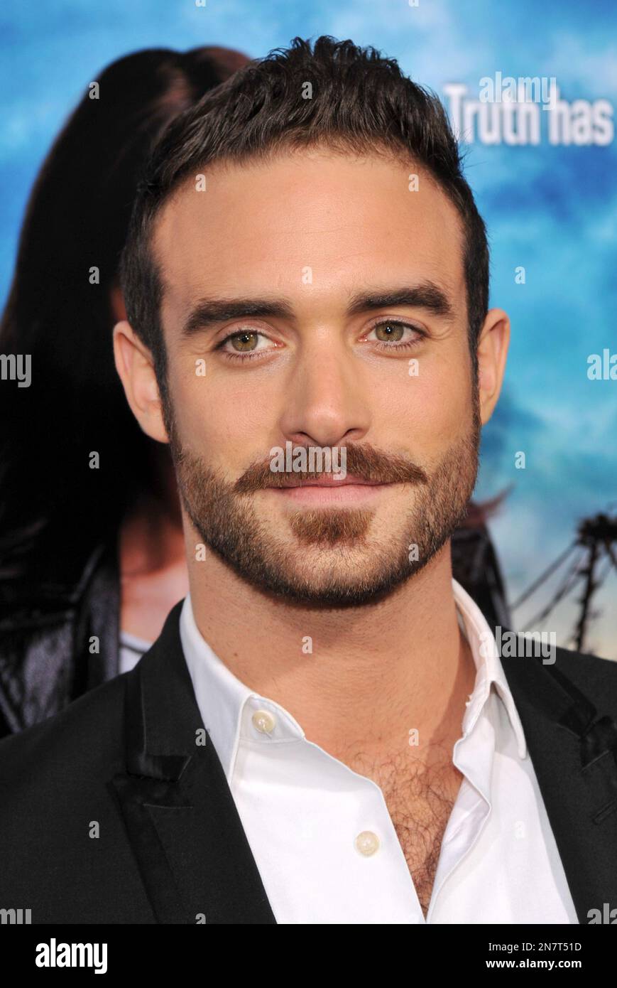 Joshua Sasse, a cast member in "Rogue," poses at the Los Angeles premiere of the DirecTV
