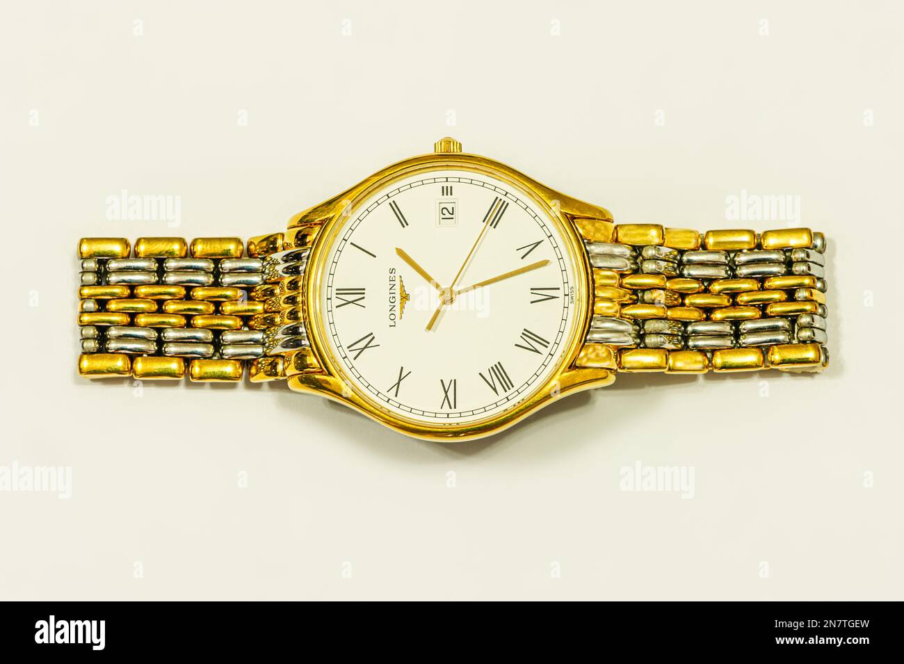 A Longines Lyre, quartz movement wristwatch, with a gold case and a gold & steel bracelet Stock Photo