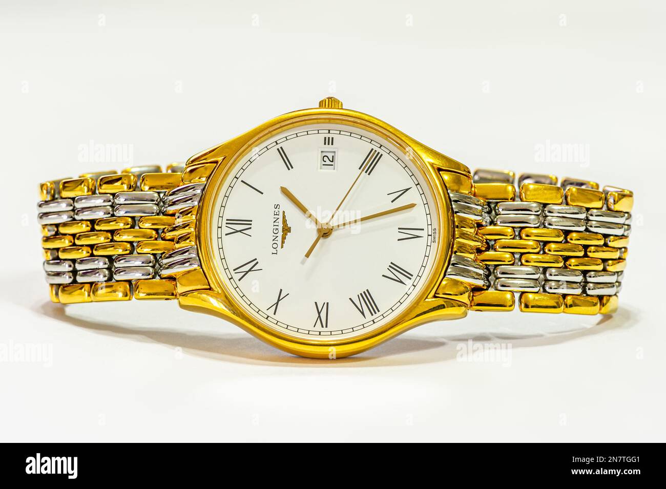 A Longines Lyre, quartz movement wristwatch, with a gold case and a gold & steel bracelet Stock Photo