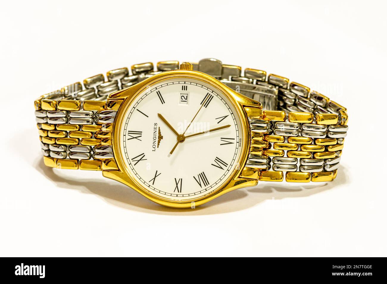 A Longines Lyre, quartz movement wristwatch, with a gold case and a gold & steel bracelet Stock Photo