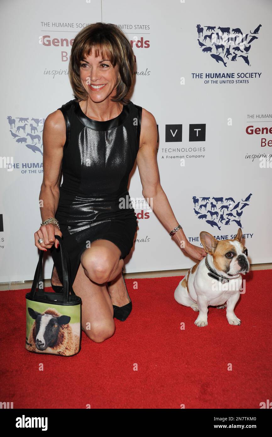 Wendie Malick arrives at the 2013 Genesis Awards Benefit Gala at The