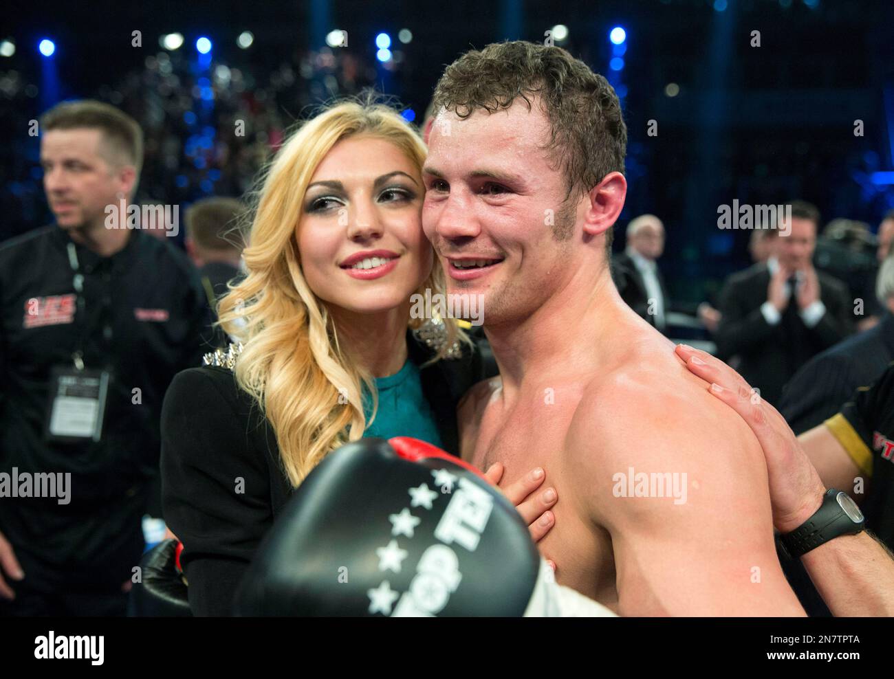 German Robert Stieglitz, right, celebrates with his wife Tatjana after winning the WBO super